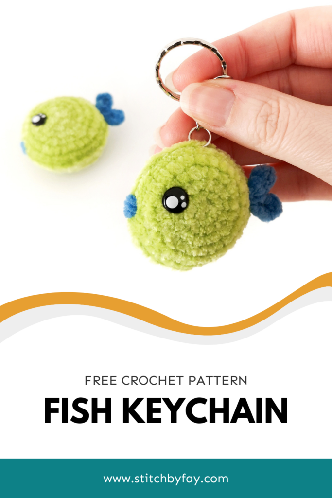Pinterest image showing two crochet fish, image overlay reads - "Free crochet pattern, fish keychain, www.stitchbyfay.com".